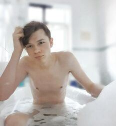 Boys in bath tub 