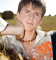 Twink Jaroslav strips on open field and jerks off solo Gay Porn