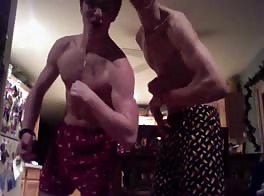 Two Shirtless Teens Compare Bodies