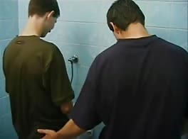 Playing with there dicks in restroom