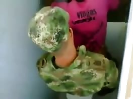 young soldier in public toilets
