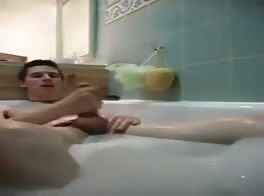 Young sexy masturbating in the bathtub