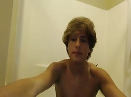 A handsome blond taking a shower