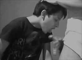 Cocksucking twink takes facial