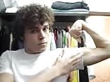Cute teenboy flexing his biceps