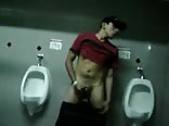 Wanking in public toilet