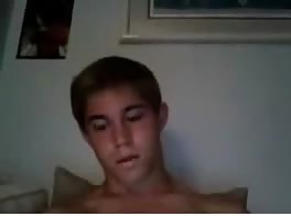 Super cute boy jerks in bed