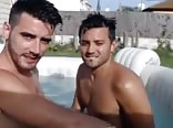 2 hot guys in a pool