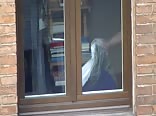 My neighbor caught naked at the window