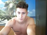 Muscular hottie teasing on cam