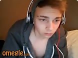 All dressed he masturbates on his bed