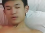 Asian boy masturbates