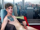 Pretty curly guy wanks on cam