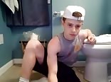 sexy redhead masturbates in her toilet