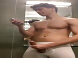 Curly hair twink porn jo in stall and drops a creamy load 