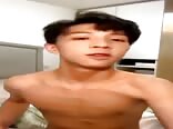 Cute Asian twink porn wanks and blows a huge load