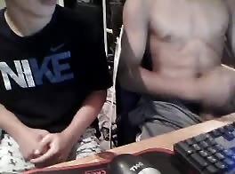 two guys masturbate