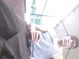 masturbating in a marquee on the street